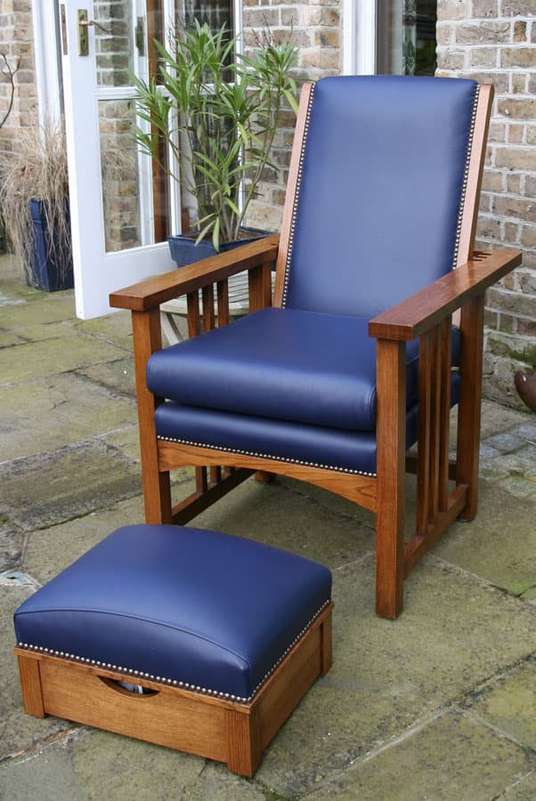 Upholstered lounge chair and foot stool